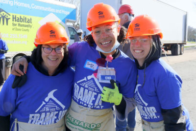 Attic Angel Community volunteers frame Habitat home